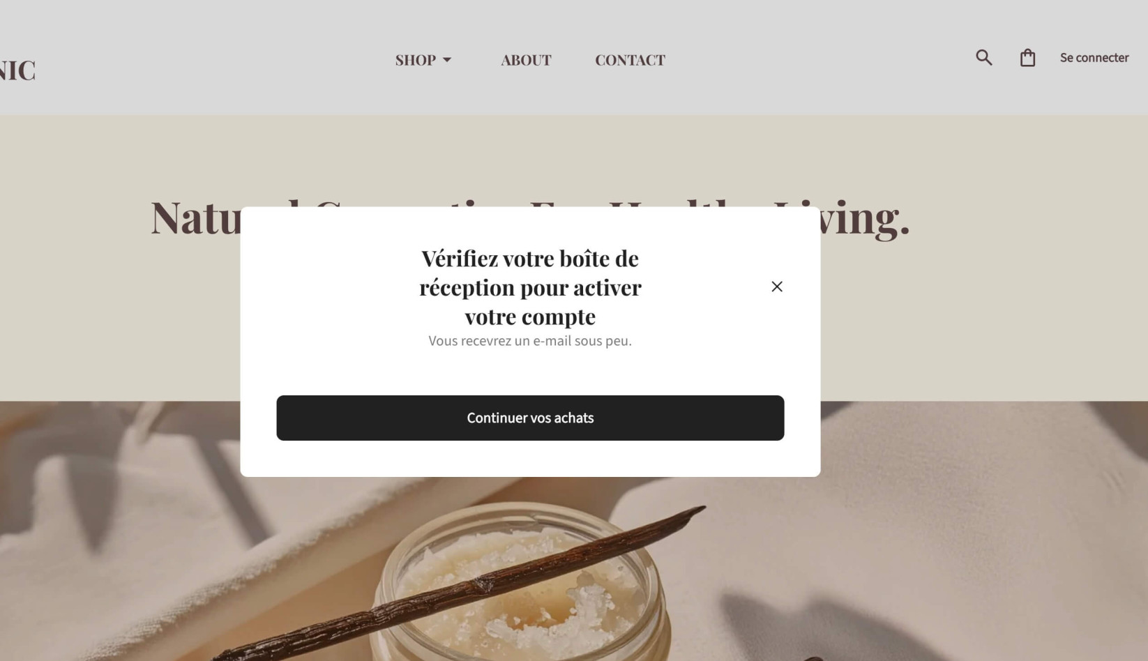 Confirmation d'activation de compte invitant le client à vérifier son e-mail pour activer son compte, avec un bouton “Continuer vos achats”.